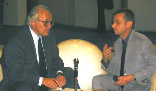 Mr. Colosanti (left) being interviewed by the
        project manager Mr. Alton-Scheidl (right) using InterviewBox